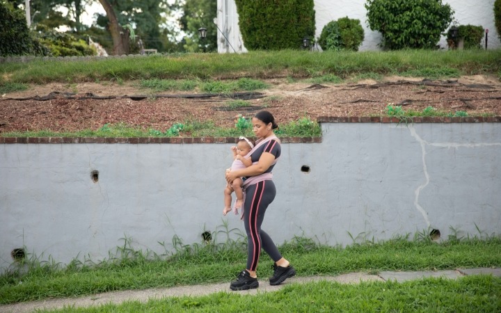 mum walking with baby