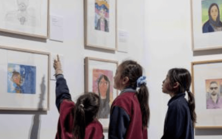 Students looking at wall